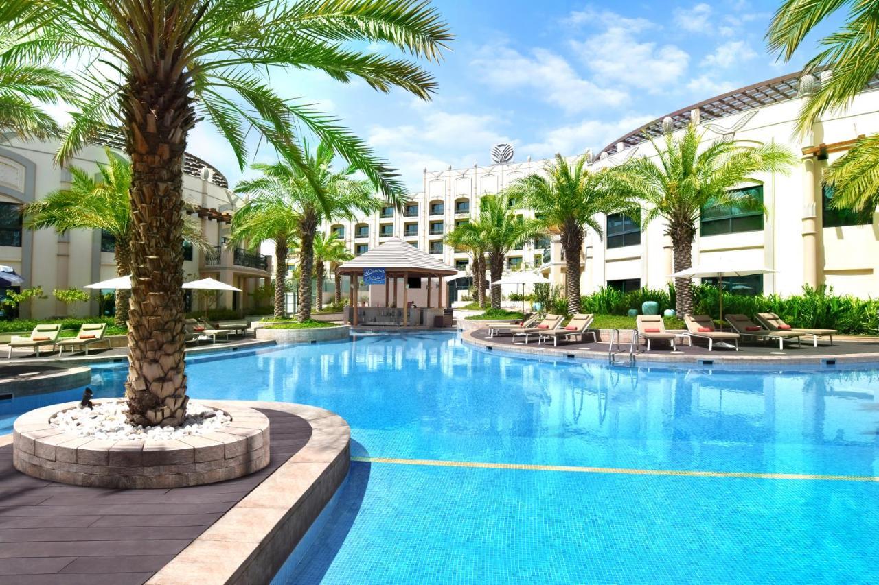 อัลไอน์ โรตานา Hotel อัลอิน ภายนอก รูปภาพ The swimming pool at the hotel